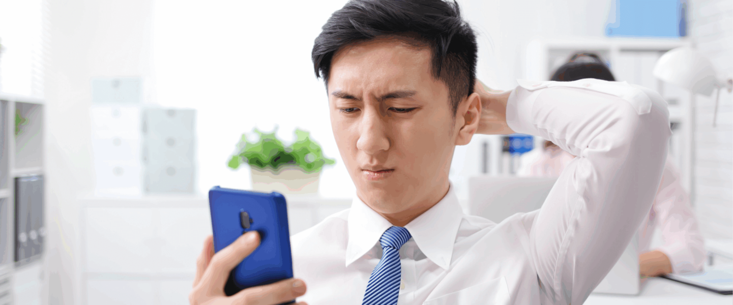 A man realizing he has a 561 credit score.