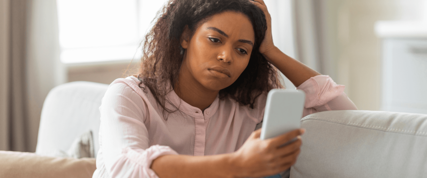 A woman learning what her 567 credit score means and how to improve it