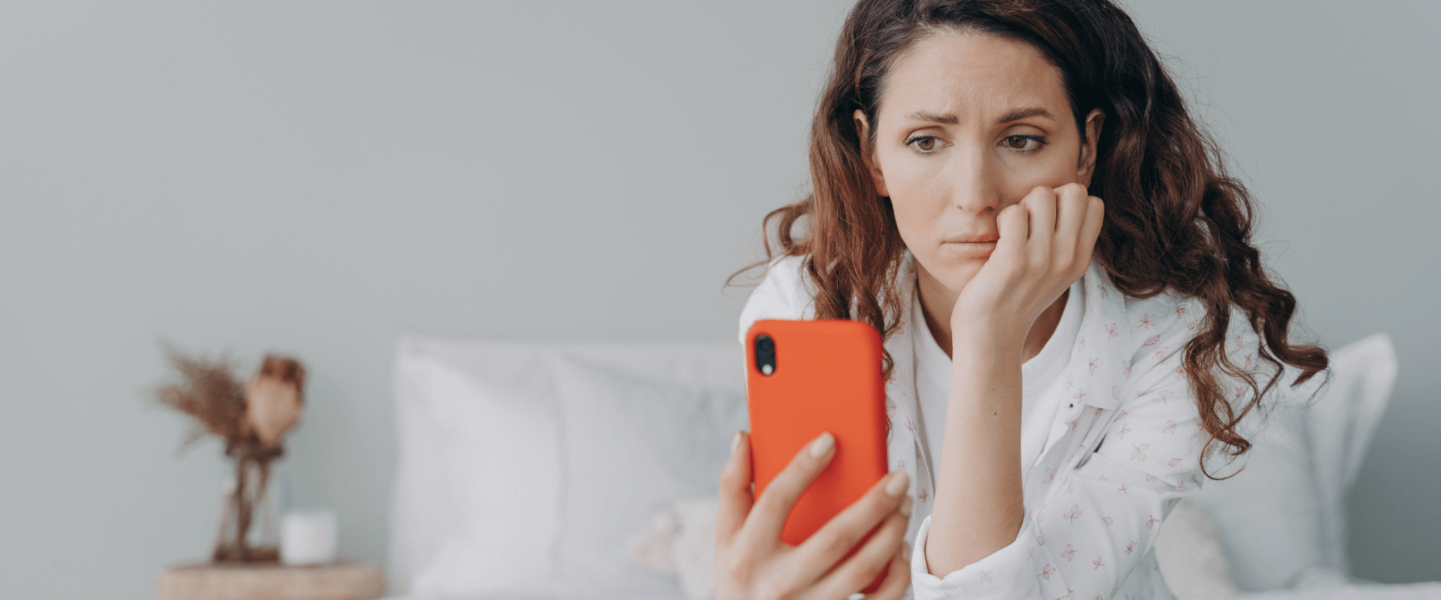 A woman researching how to get a 700 credit score during a chapter 13 bankruptcy.