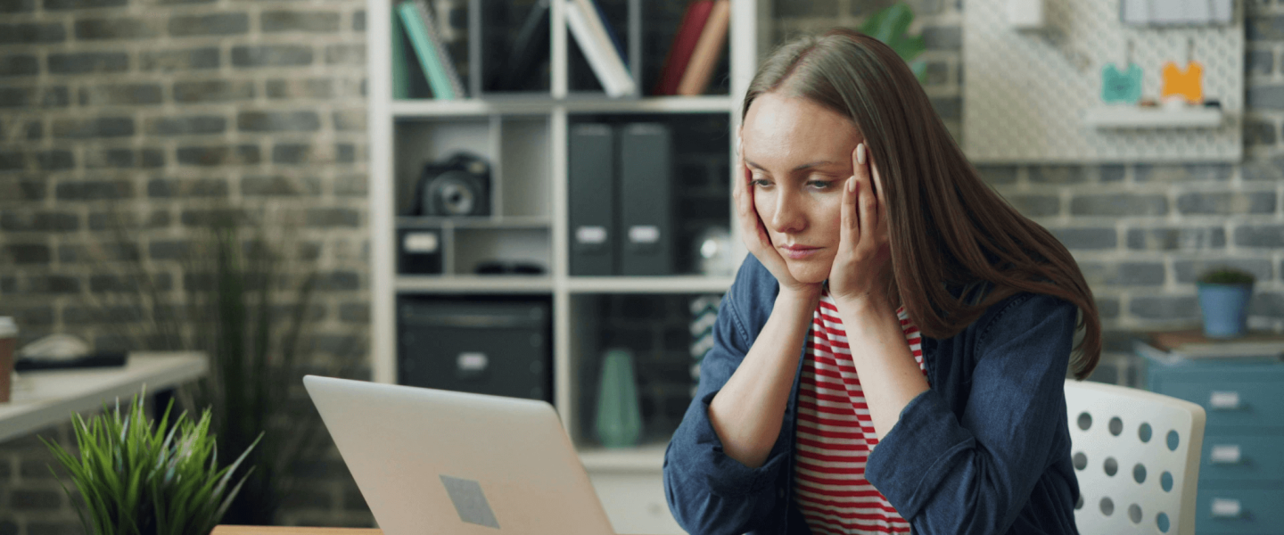 A woman researching how a personal loan will impact her credit score.