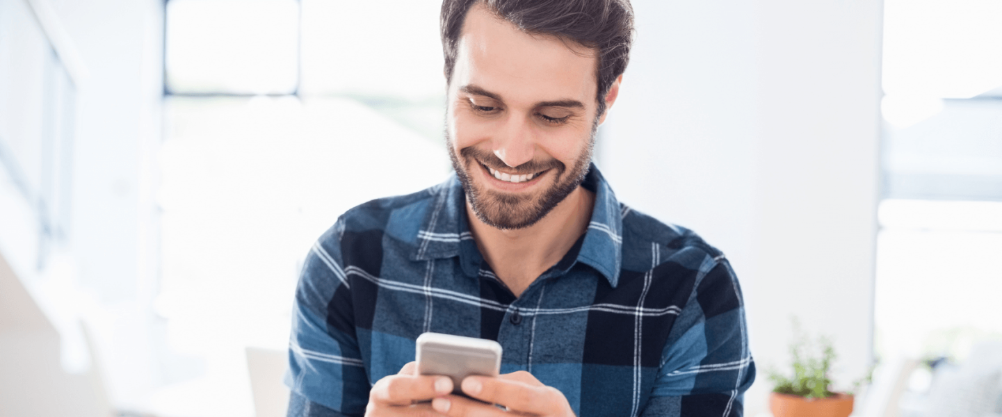 A man researching what a credit score under 700 means and how to improve it.
