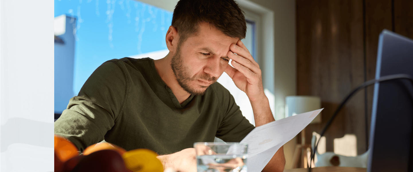 A man trying to figure out the different between credit monitoring and identity theft protection