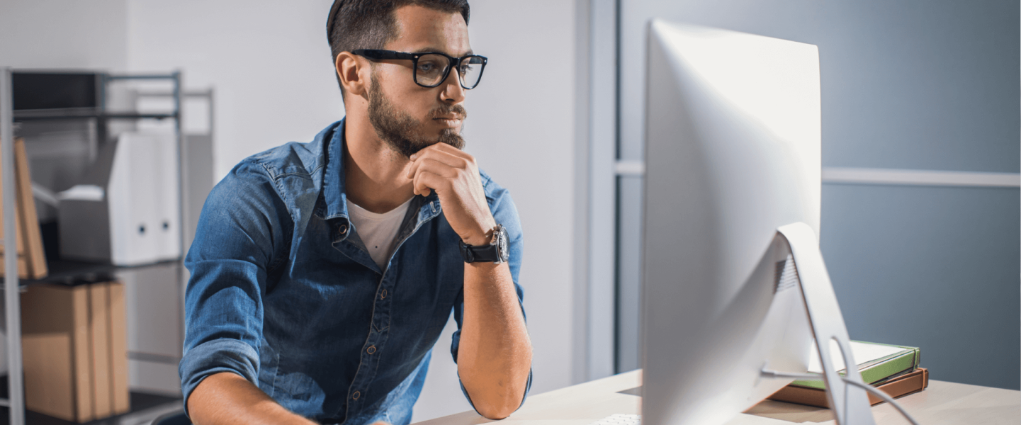 A man learning what a 584 credit score means and how to improve it.