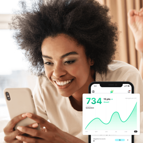 A woman on her laptop researching how much she can borrow with a 750 credit score.