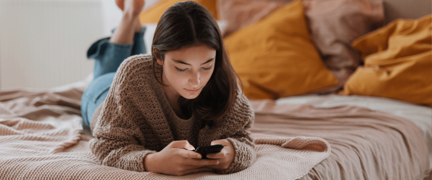 A woman researching her 565 credit to learn what it means and how to improve it.