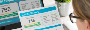 A woman looking over her credit report.