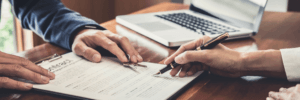 Signing a lease agreement.
