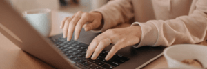 Woman researching on her laptop.