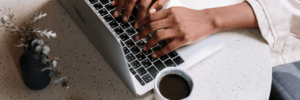 A woman researching how to manage a 750 credit score.