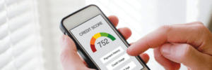 Person using a credit monitoring app.