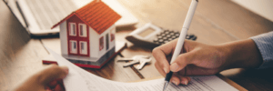 Signing a mortgage.