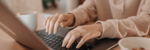 A woman comparing loans on her laptop.
