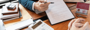 Someone looking through a loan application.
