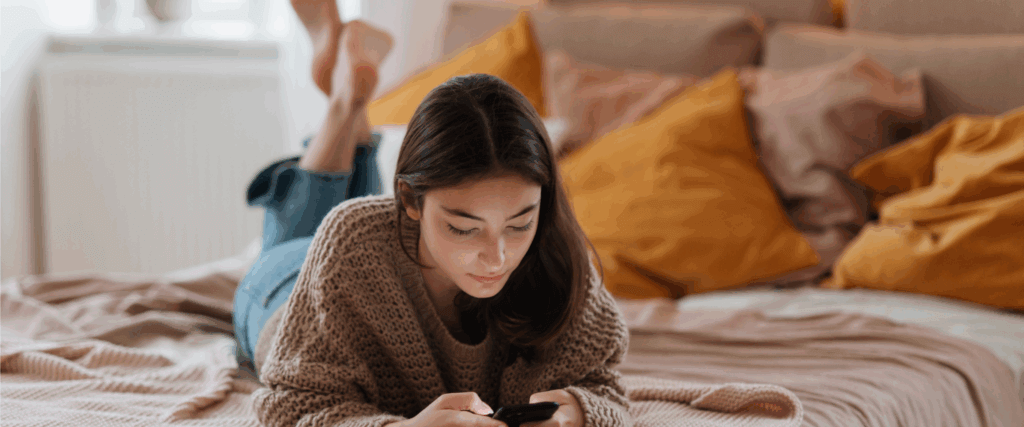 A woman looking up what a 746 credit score means.