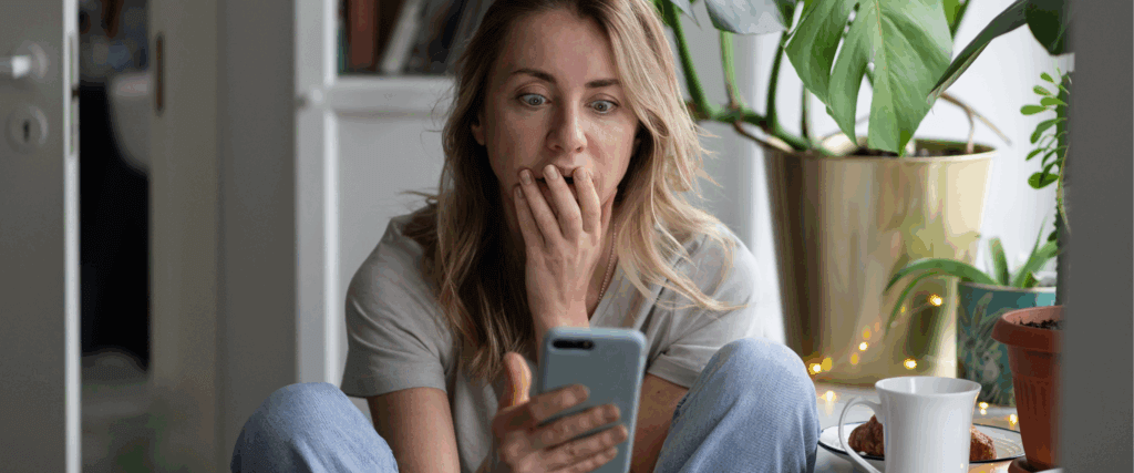 A woman looking up a 400 credit score.