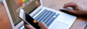 A man researching what his credit score means.