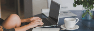 A woman researching how to improve her 530 credit score.