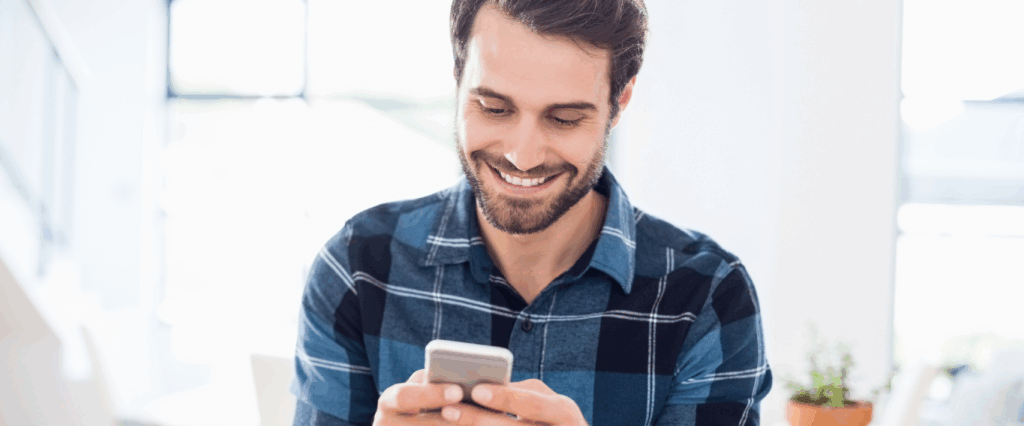 A man researching what a credit score under 700 means and how to improve it.