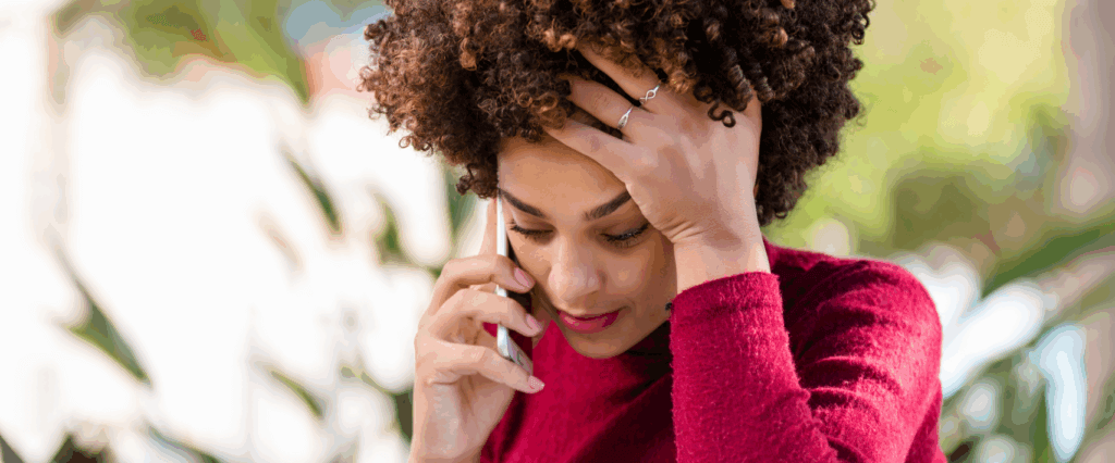 A woman researching what it means it have a credit score under 500 and how to improve it.